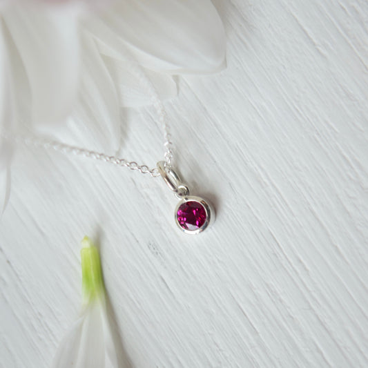 SS Imitation Mozambique Garnet Charm 86179