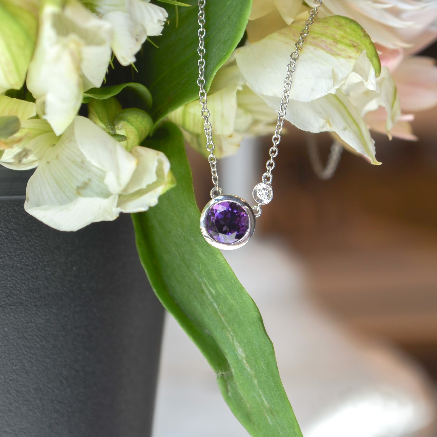 SS .69ct Amethyst .02 Dia Necklace NK5241SV5AM- 17.5
