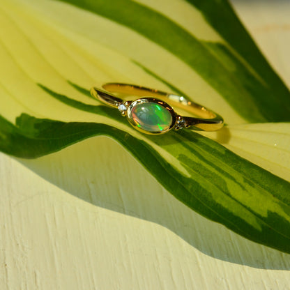 14kY 6x4mm Ethiopian Opal & .03ct Dia Ring 72315-6.75