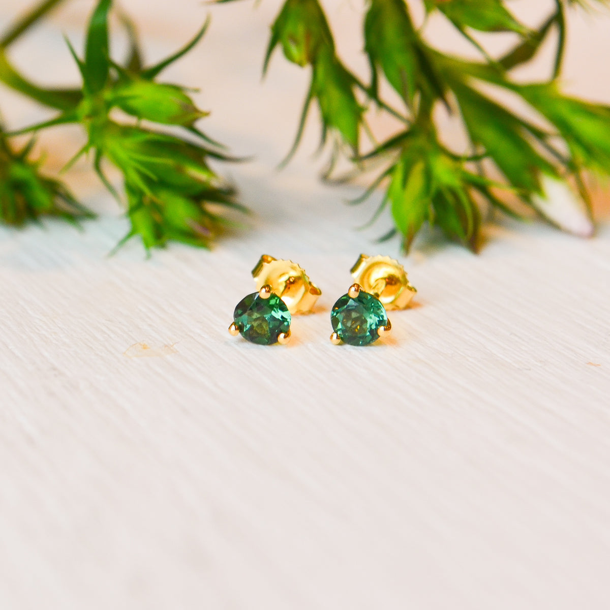 18kY .59cttw Green Tourmaline Studs