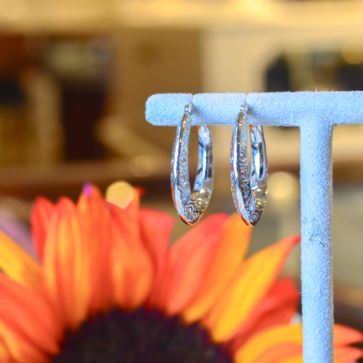 SS Small Swirl Hoop Earring 64/330