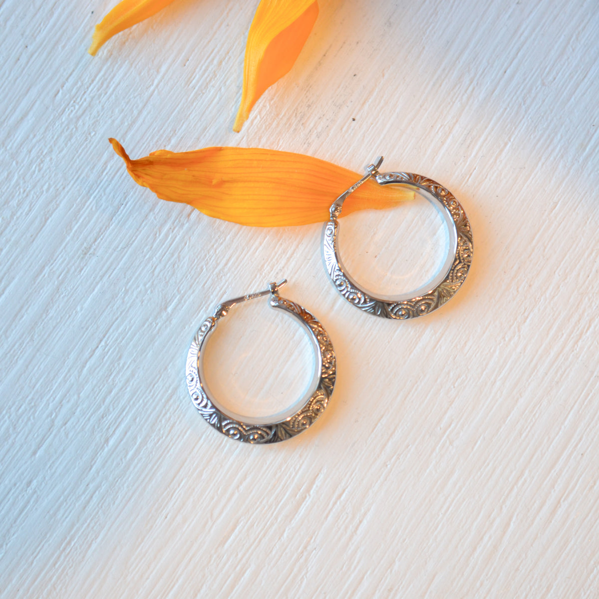 SS Small Swirl Hoop Earring 64/330