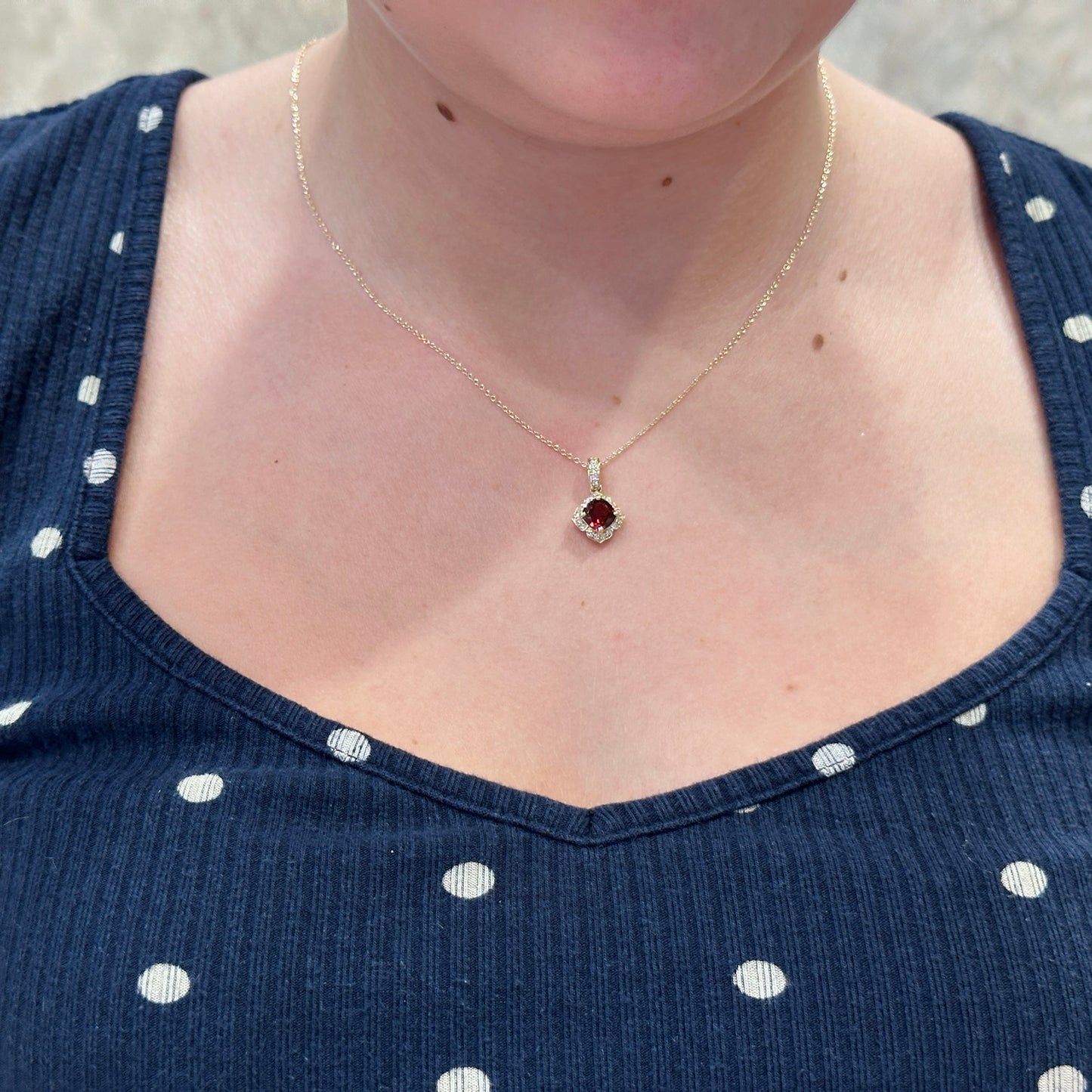14kY 5mm Garnet .22cttw Diamond Pendant