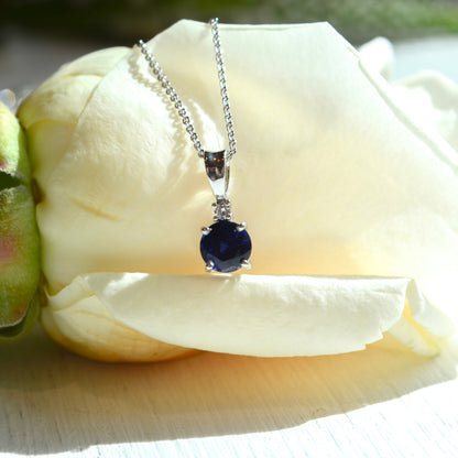 14kW .86ct Sapphire .02ct Diamond Pendant