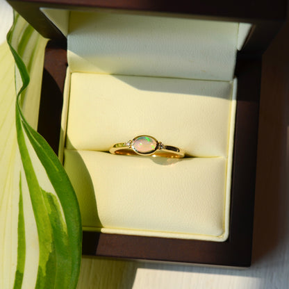 14kY 6x4mm Ethiopian Opal & .03ct Dia Ring 72315-6.75