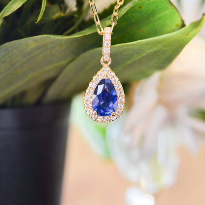 14kY 1.54ct Ceylon Sapphire .16cttw Diamond Halo Pendant