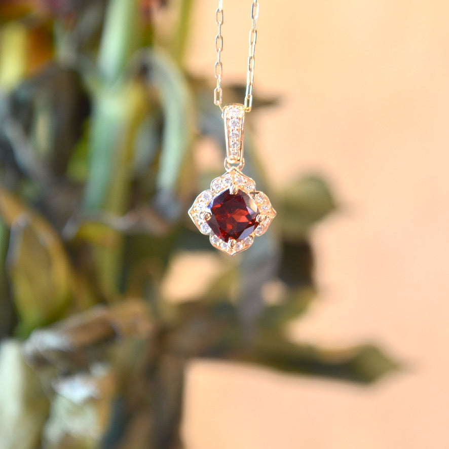 14kY 5mm Garnet .22cttw Diamond Pendant