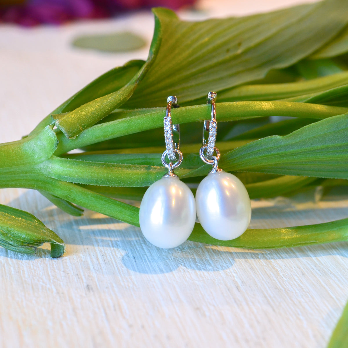 14kW Cultured Pearl .06cttw Diamond Earring SC55023675