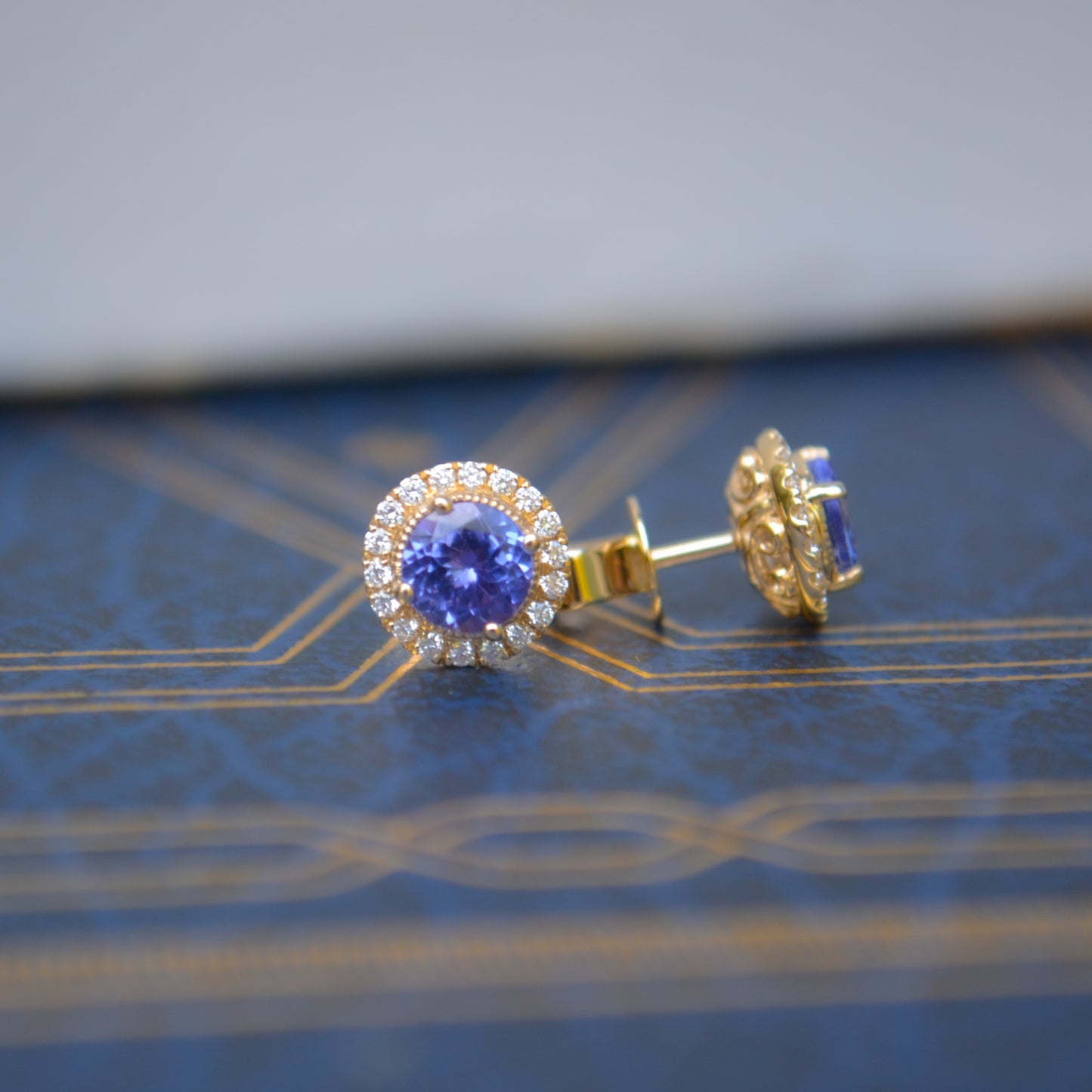 14kY 1.06cttw Tanzanite .17cttw Diamond Stud TEQ7120NTN