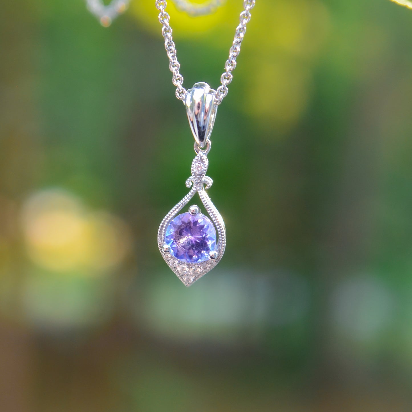 14kW .56ct Tanzanite .04cttw Diamond Pendant TPQ7127CTN