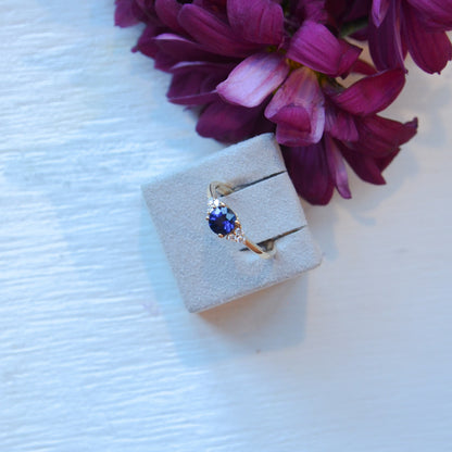 18kY 1.08ct Sapphire .13cttw Diamond Ring