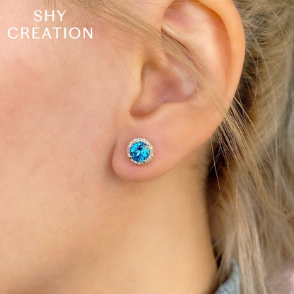 14kY 2.06cttw Blue Topaz .14cttw Diamond Stud SC55006938