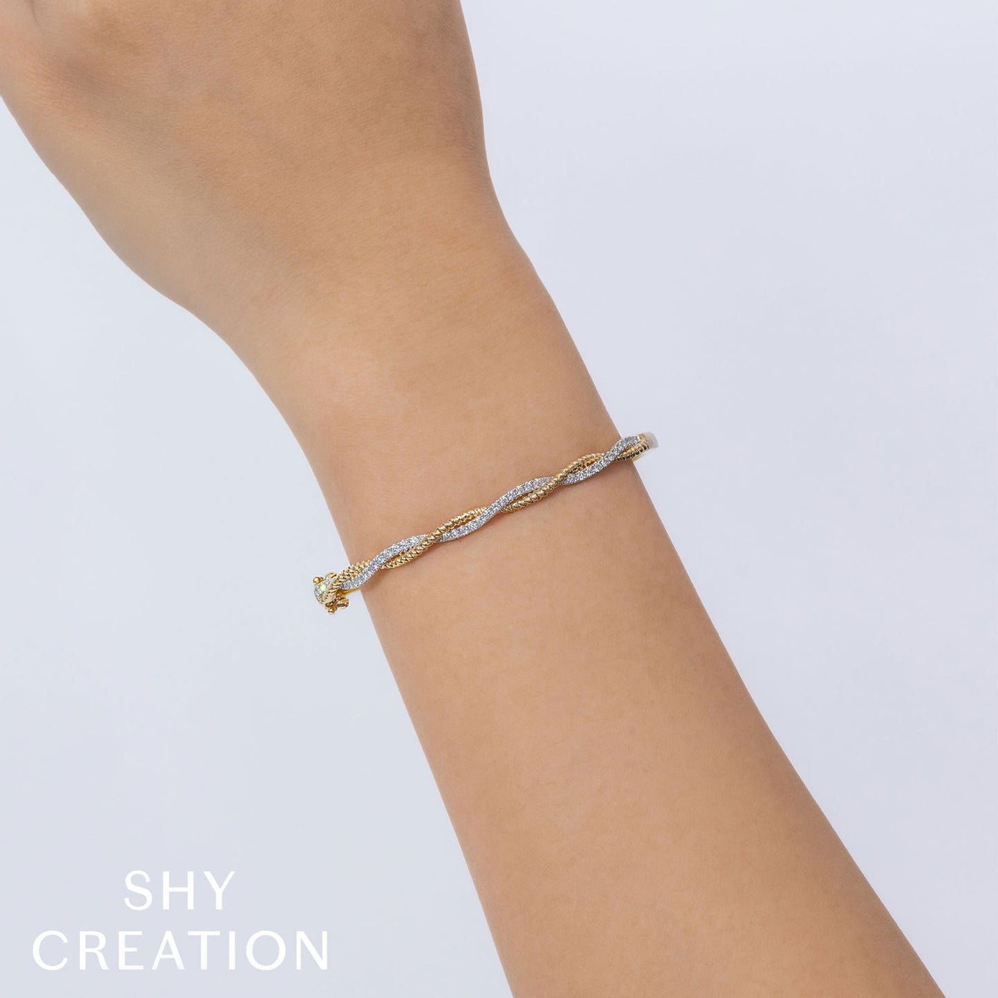 14kY .54cttw Diamond Twist Bangle SC55025550RDZM