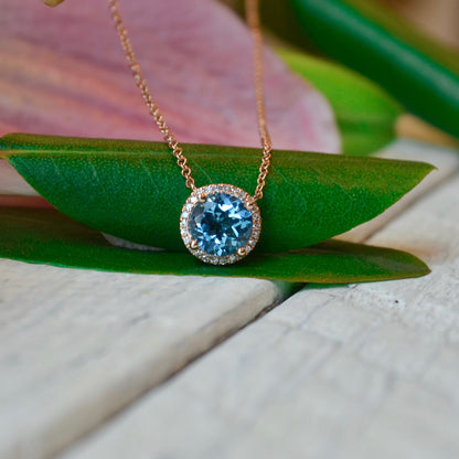 14kR 1.80ct Blue Topaz .08cttw Dia Necklace SC55007031