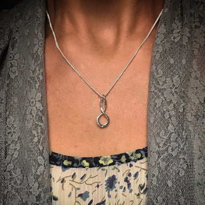 SS Infinity Necklace PE54212-18